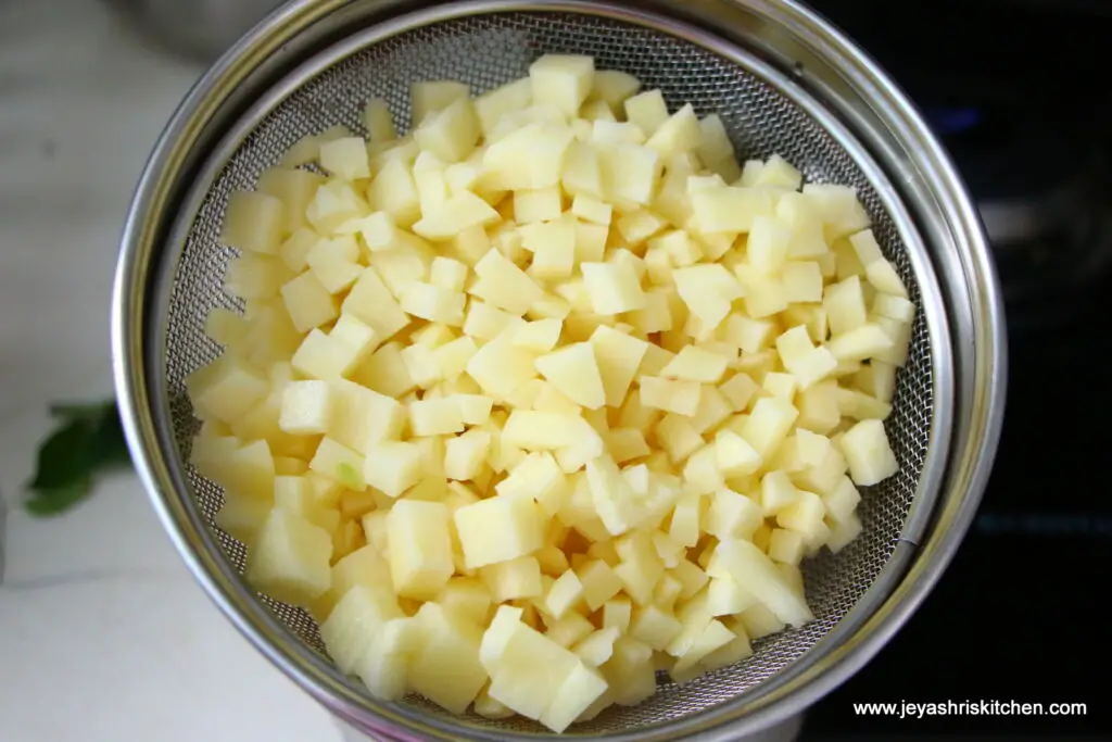 Potato fry on Cast Iron Kadai • - Essential Traditions